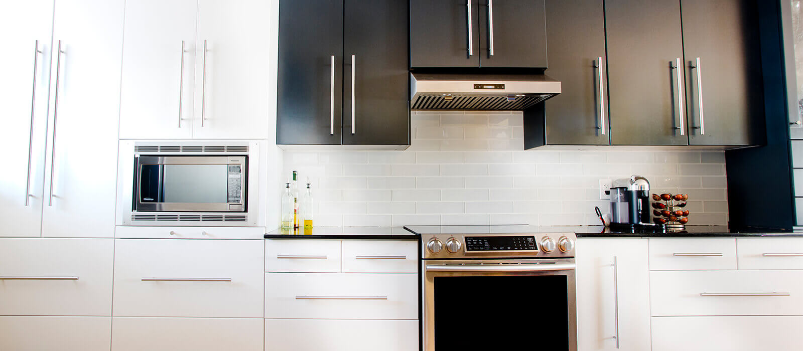 N-Hance refinished kitchen with light brown wood and silver accents