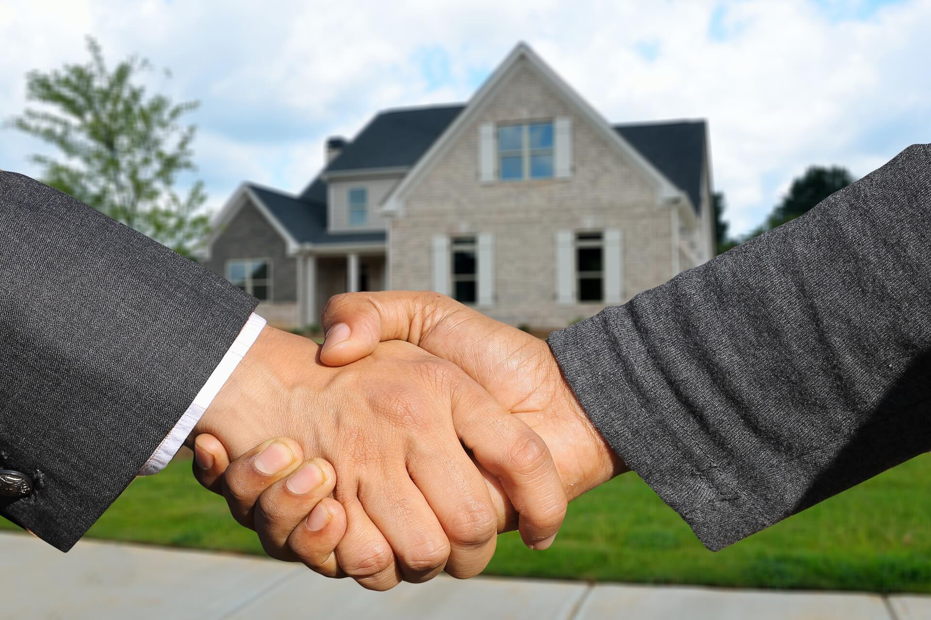 N-Hance Employee Shaking Hands with Customer