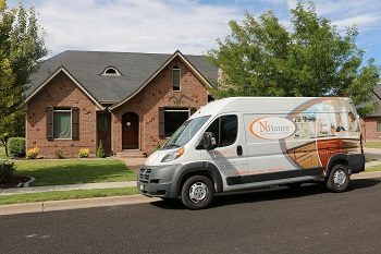 N-Hance van packed outside a customer's house