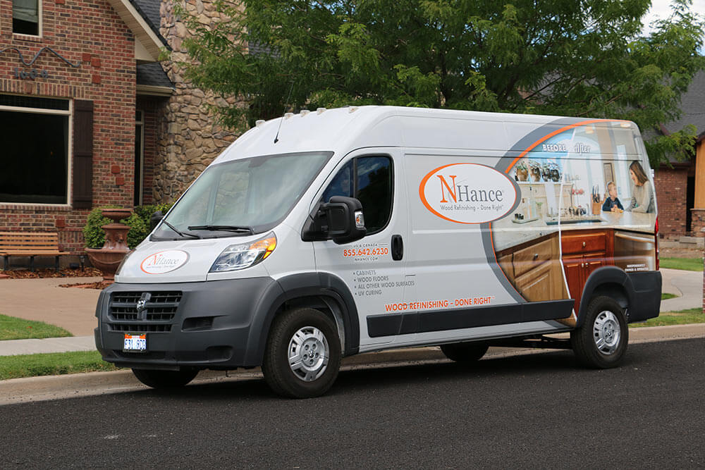 N-Hance wood franchise van in a neighborhood