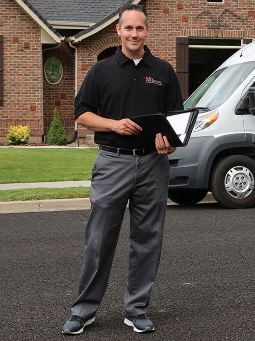 Photo of N-Hance tech in front of van Photo of N-Hance tech in front of van